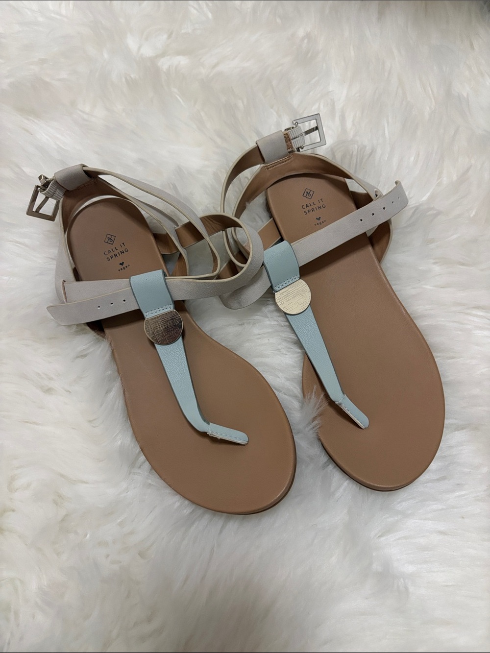 Call It Spring White and Light Blue T-Strap Sandals with Gold Accents